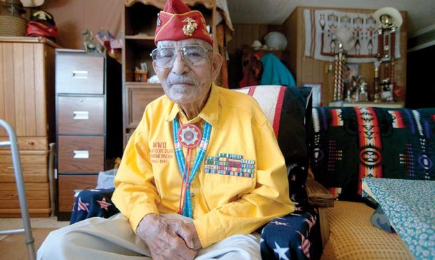 Honor Riders help code talker repair roof