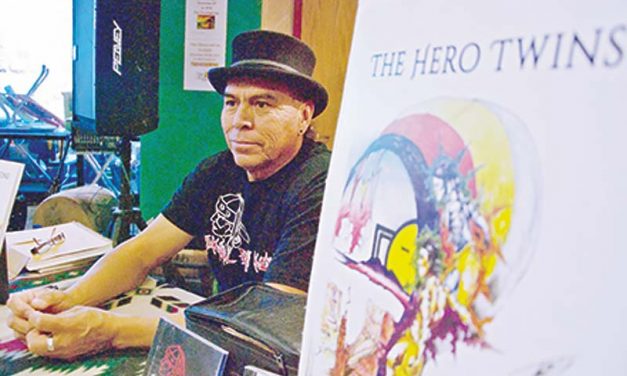Artist paints pictures for book to preserve Diné bizaad