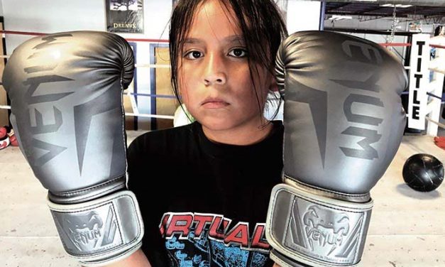 Young Diné brothers learn the boxing trade