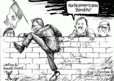 Norteamericano Bandito! Begaye trying to climb wall back to Mexico.