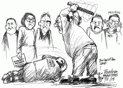 NNPD police chief being beaten on ground by law and order committee.