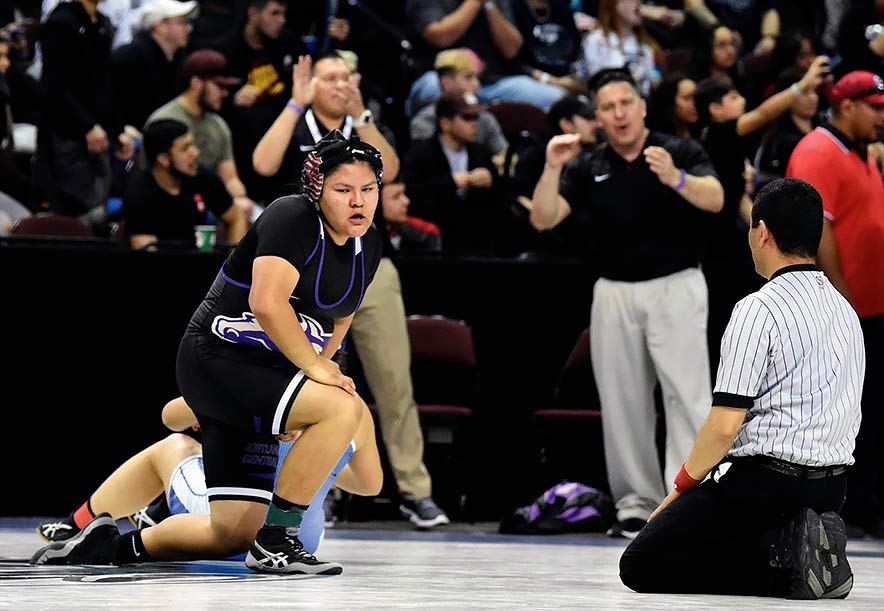 Being cut from b-ball fortuitous for KC wrestler