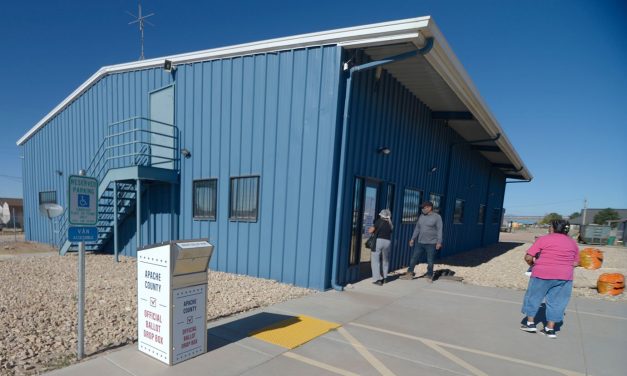 Retired teacher won’t let closed voting booth stop her