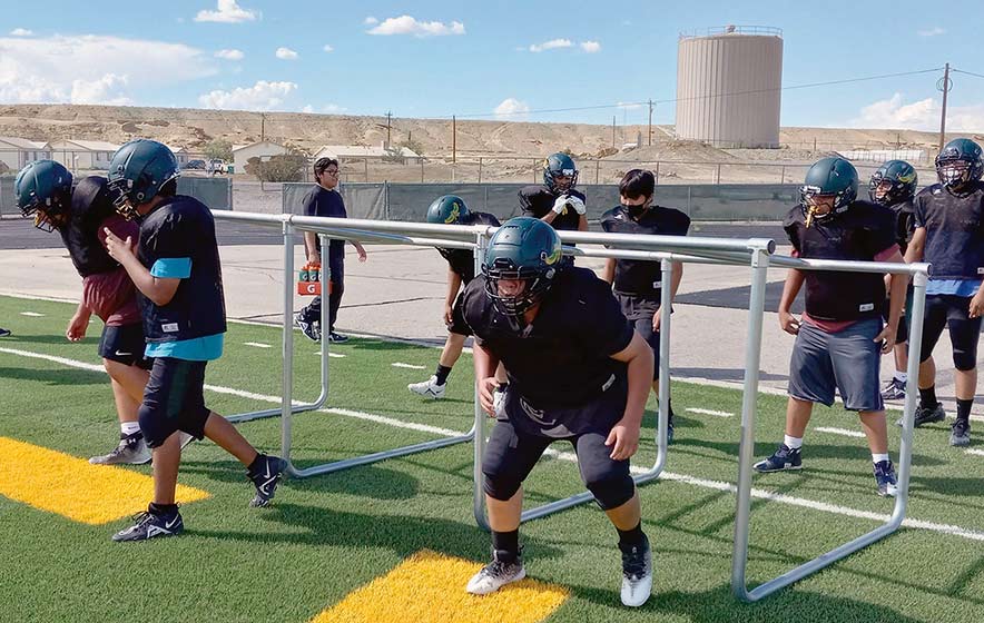 Texas coach takes over Newcomb football program
